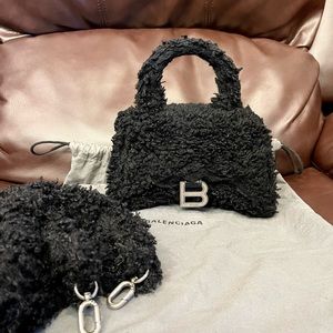 Balenciaga hourglass XS faux fur furry fluffy top handle handbag black leather